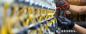 Electrician,Use,Electrical,Measuring,Tool,Meter,At,Main,Panel,Circuit
